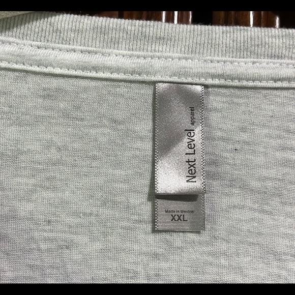 2 Pride tees for $9! Never worn. ‘Love is Love’ tee new with tags. - Picture 8 of 8